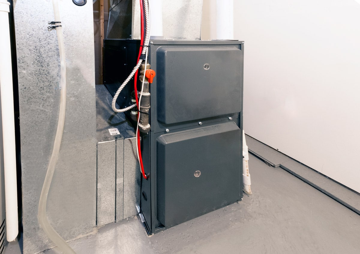 Indoor furnace unit in a basement